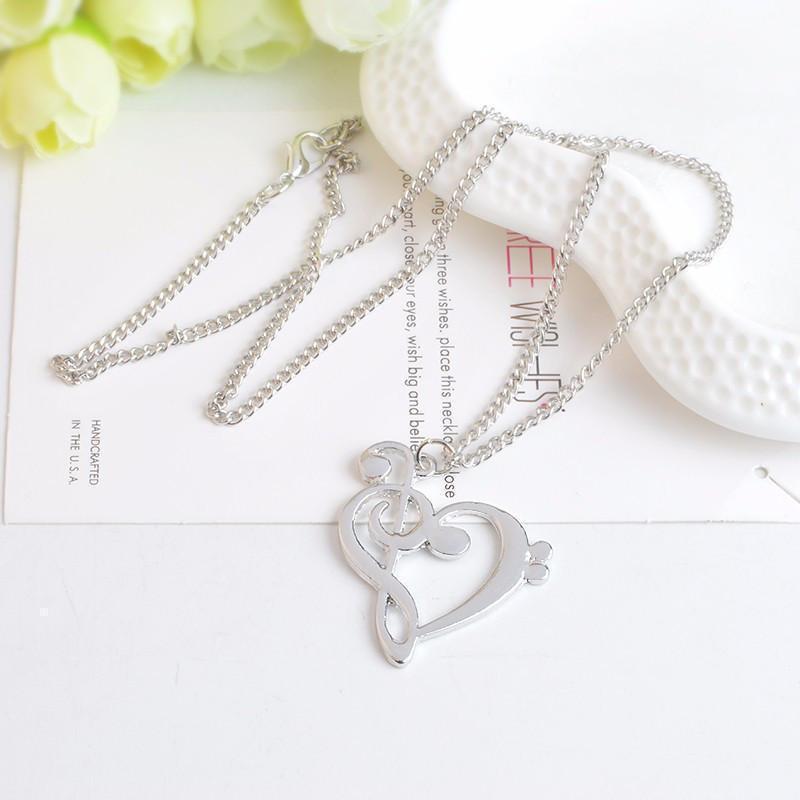 Halsketten Treble und Clef Heart Pendelled